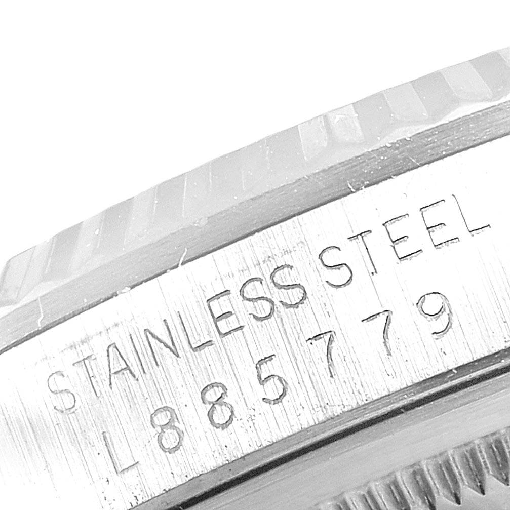 This is a close-up image of the serial number and material engraving on a stainless steel Rolex Datejust 16234 Men's Stainless Steel Silver Dial 16234 Men's Stainless Steel Silver Dial watch.