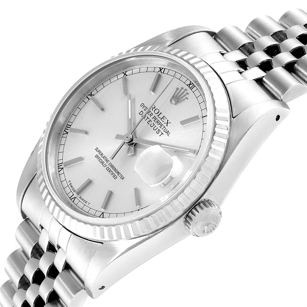 This image shows a Rolex Datejust 16234 Men's Stainless Steel Silver Dial 16234 Men's Stainless Steel Silver Dial watch at a tilted angle, focusing on the dial, crown, and bracelet.