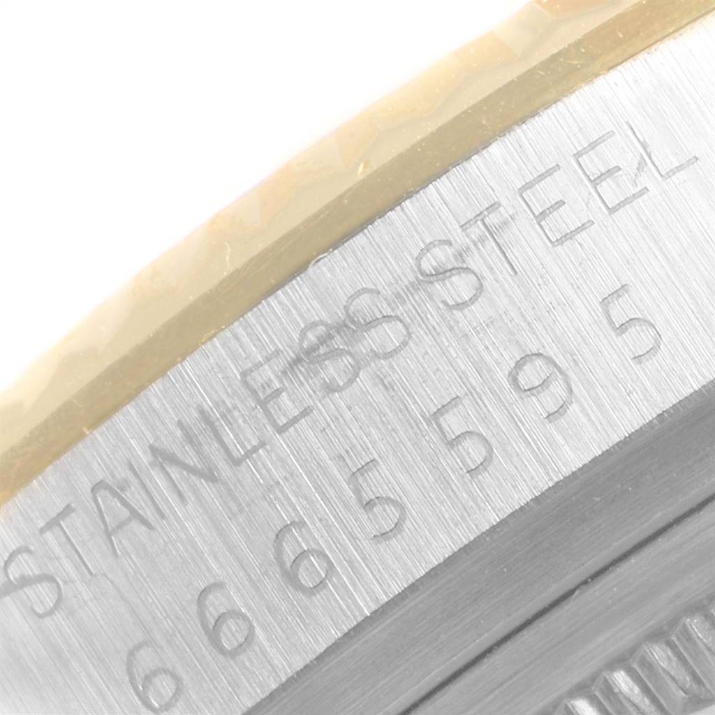 This close-up image shows the engraved serial number on the stainless steel case of a Rolex Vintage Collection 16013 Men's Steel and Gold (two tone) Champagne Dial 16013 Men's Steel and Gold (two tone) Champagne Dial watch.