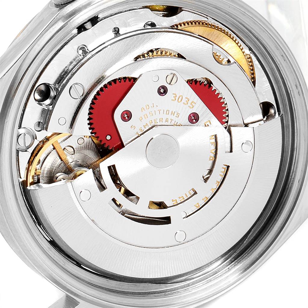 This image shows an angled close-up of the internal movement and mechanism of the Rolex Vintage Collection 16013 Men's Steel and Gold (two tone) Champagne Dial 16013 Men's Steel and Gold (two tone) Champagne Dial watch.