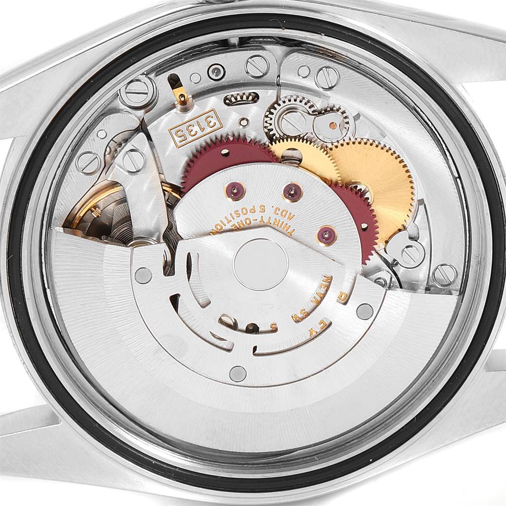 This image shows a close-up view of the Rolex Datejust 16200 Men's Stainless Steel Blue Dial 16200 Men's Stainless Steel Blue Dial watch's internal movement and mechanics from the back.