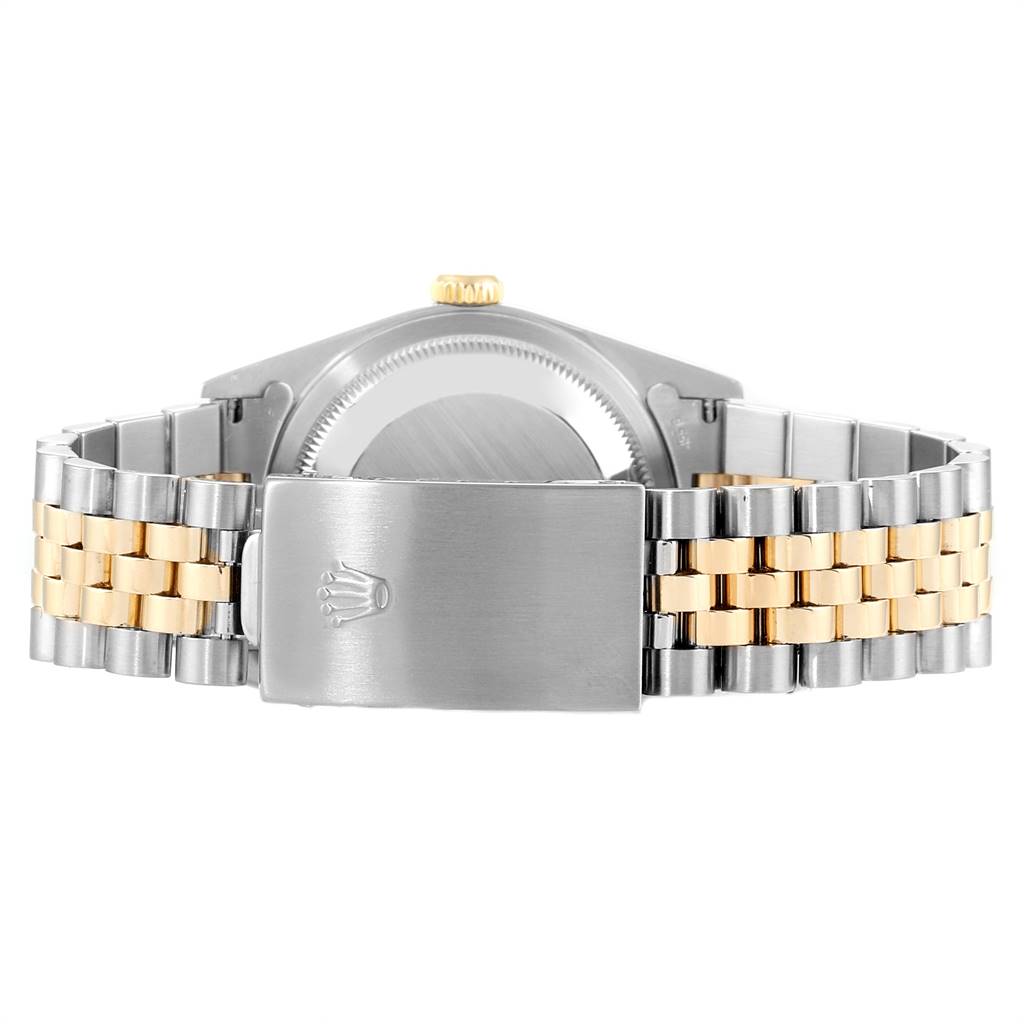 The image shows the back view of a Rolex Datejust 16233 Men's Steel and Gold (two tone) Silver Dial 16233 Men's Steel and Gold (two tone) Silver Dial watch, highlighting its case back and two-tone metal bracelet.