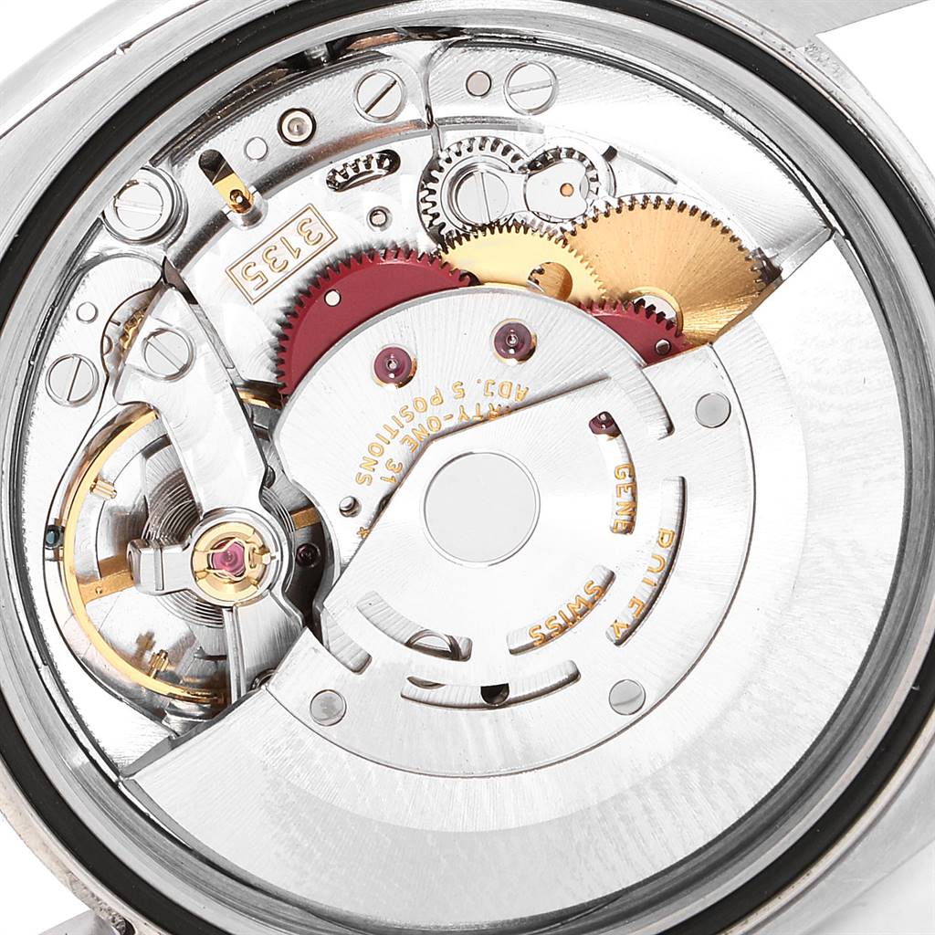 This image shows a close-up view of the movement mechanism of the Rolex Datejust 116234 Men
s Stainless Steel Grey Dial 116234 Men
s Stainless Steel Grey Dial.