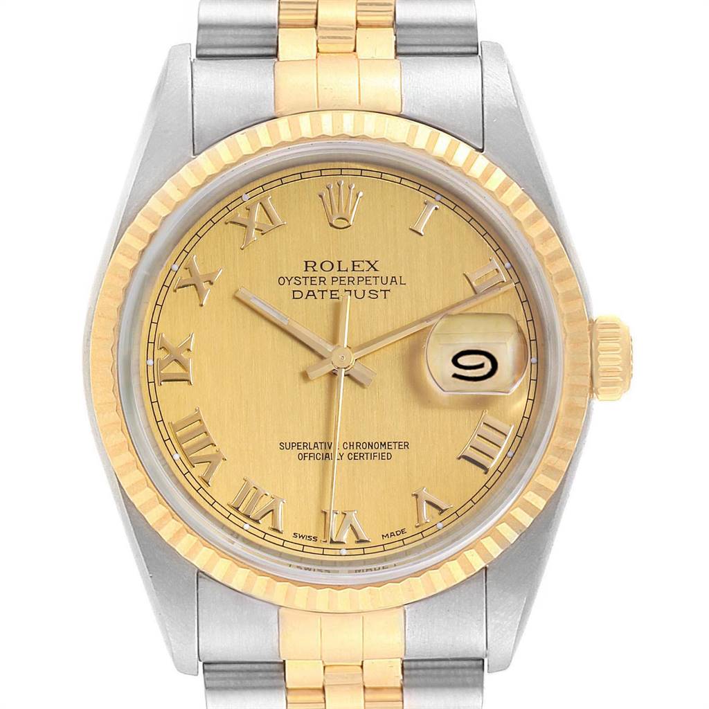 This image shows a Rolex Datejust 16233 Men
s Steel and Gold (two tone) Champagne Dial 16233 Men
s Steel and Gold (two tone) Champagne Dial watch from a front angle, highlighting its gold dial, two-tone bracelet, and fluted bezel.