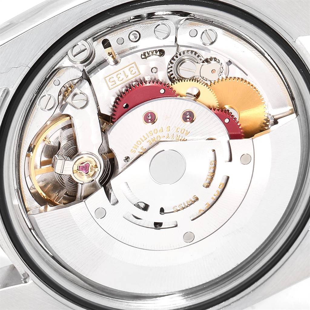 The image shows the intricate back view of the movement and internal mechanism of a Rolex Datejust 116234 Men's Stainless Steel White Dial 116234 Men's Stainless Steel White Dial watch.