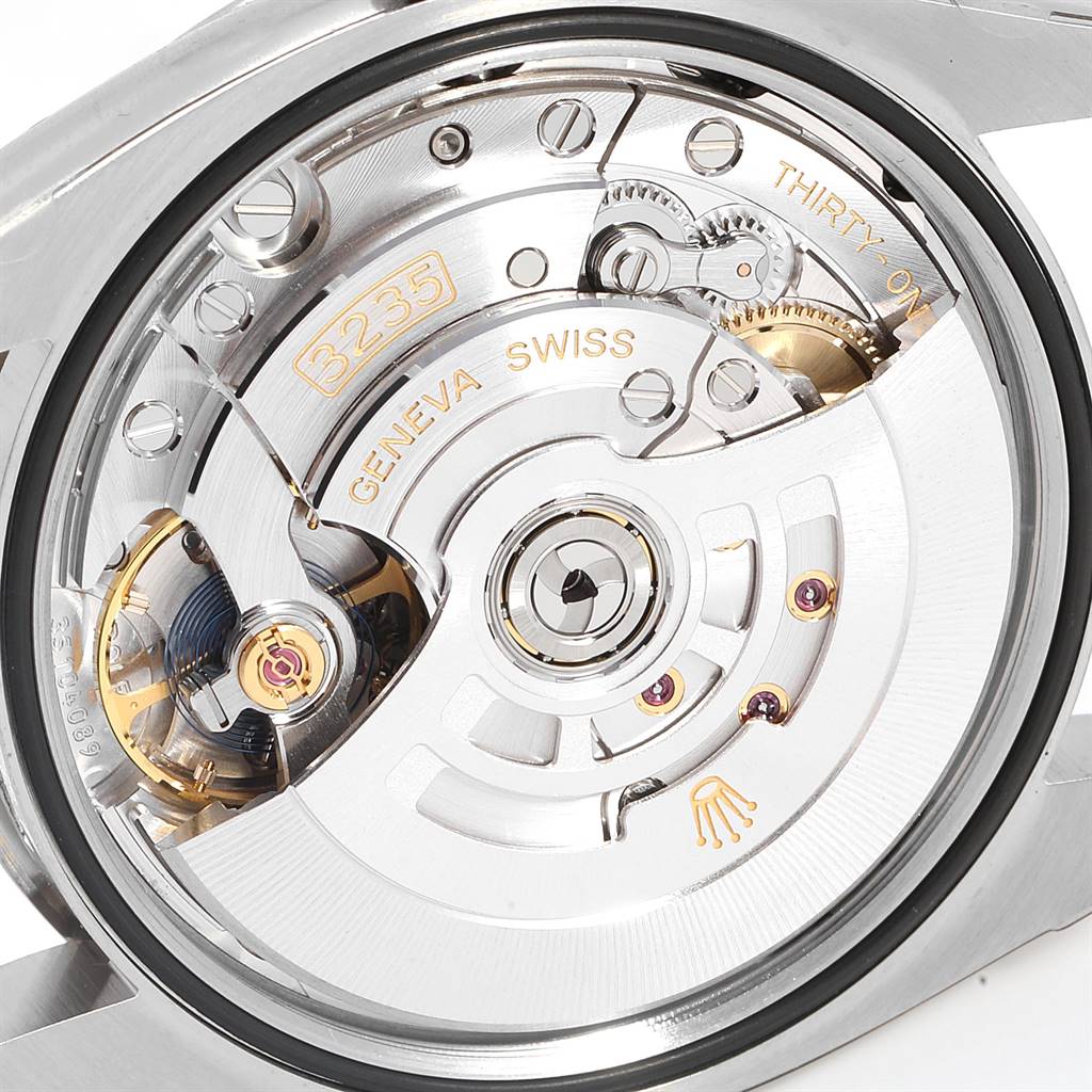 This image displays the movement mechanism of the Rolex Datejust 126234 Men's Stainless Steel Silver Dial 126234 Men's Stainless Steel Silver Dial watch, showcasing its intricate internal components from the back angle.