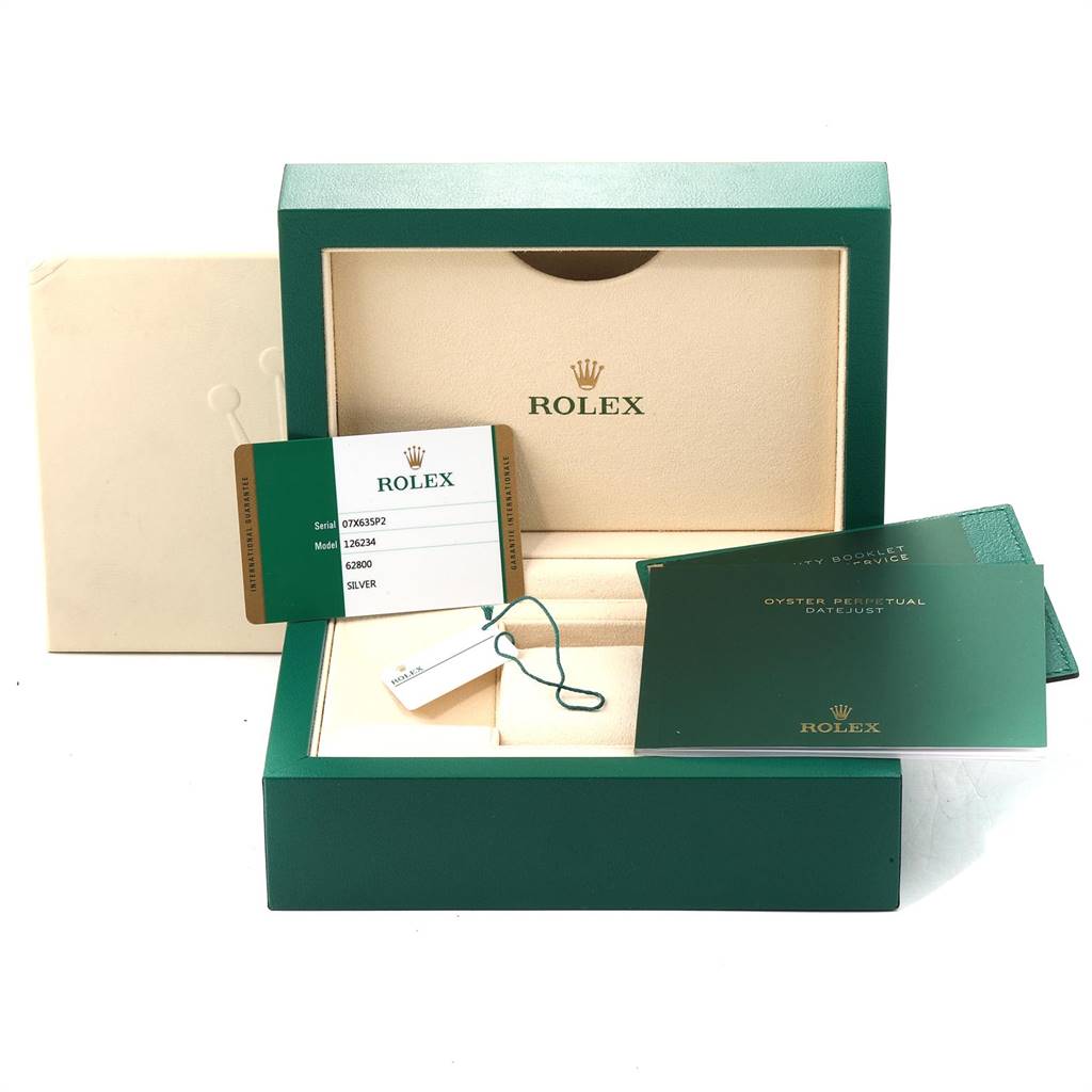 The image shows the packaging, warranty card, and booklets for a Rolex Datejust 126234 Men's Stainless Steel Silver Dial 126234 Men's Stainless Steel Silver Dial watch.