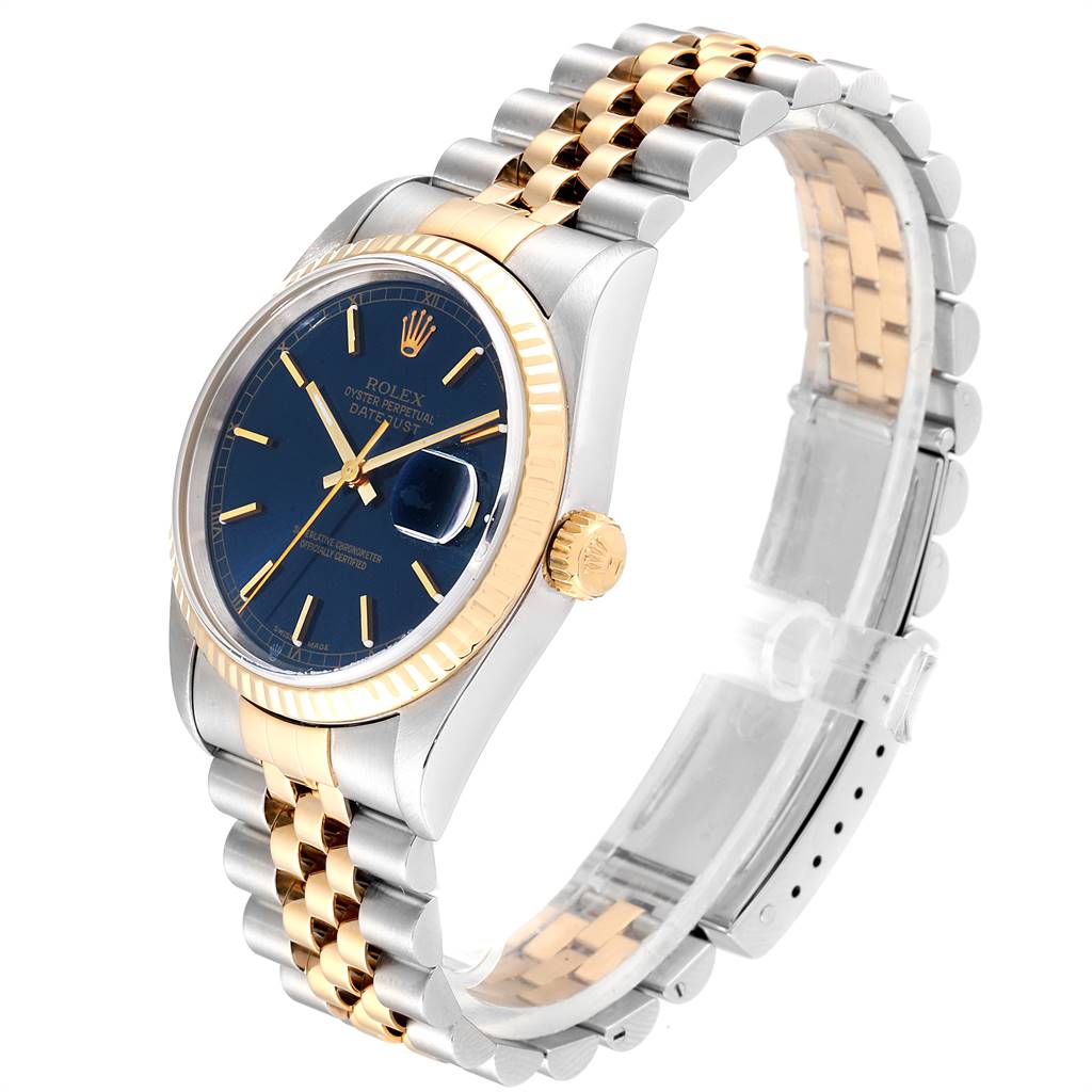 The Rolex Datejust 16233 Men's Steel and Gold (two tone) Blue Dial 16233 Men's Steel and Gold (two tone) Blue Dial watch is shown at a three-quarter angle, highlighting its dial, bezel, and Jubilee bracelet.