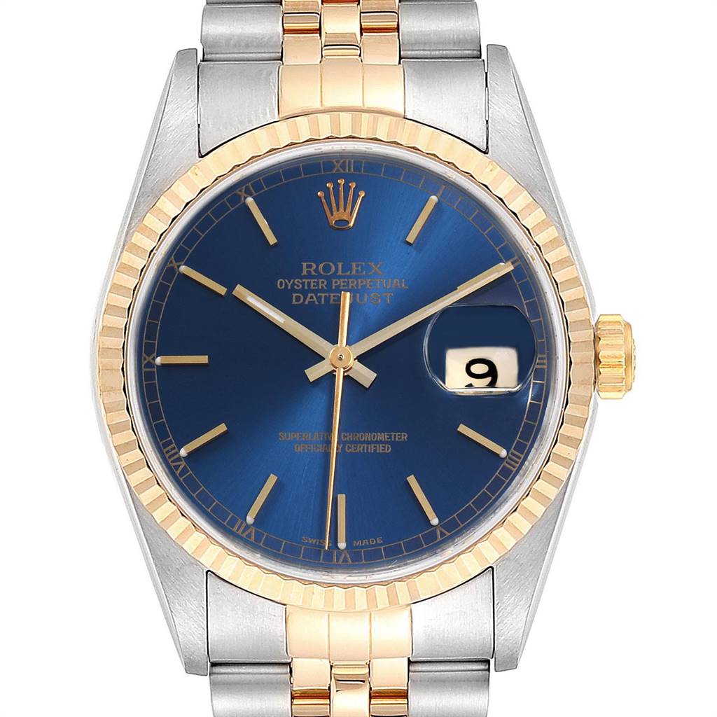 This image shows the front view of a Rolex Datejust 16233 Men's Steel and Gold (two tone) Blue Dial 16233 Men's Steel and Gold (two tone) Blue Dial watch, highlighting the blue dial, gold fluted bezel, and the date display.