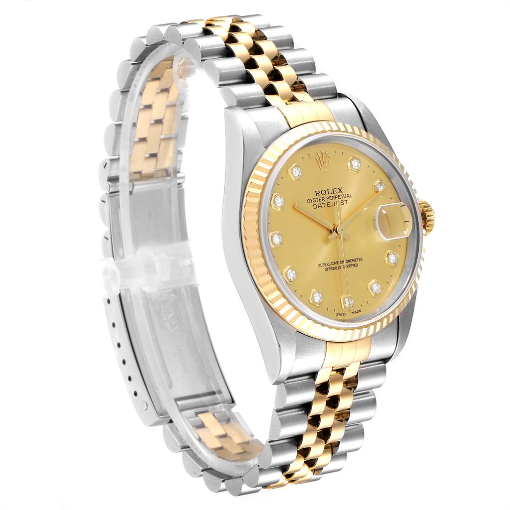 This Rolex Datejust 16233 Men
s Steel and Gold (two tone) Champagne Dial 16233 Men
s Steel and Gold (two tone) Champagne Dial watch is shown at a three-quarter angle, highlighting its two-tone bracelet, gold dial, and fluted bezel.