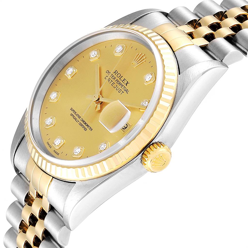 The image shows a close-up angle of a Rolex Datejust 16233 Men
s Steel and Gold (two tone) Champagne Dial 16233 Men
s Steel and Gold (two tone) Champagne Dial watch, highlighting the dial, bezel, and part of the bracelet.