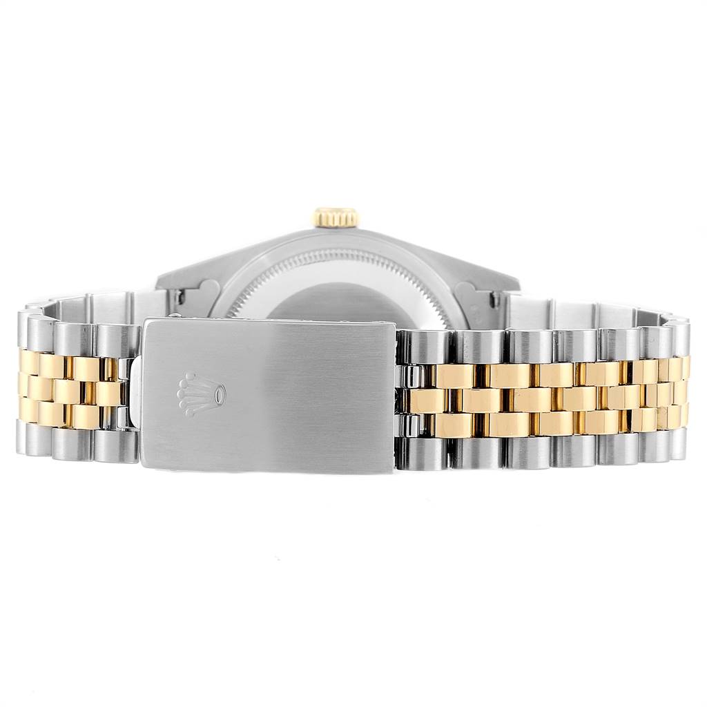 This image shows the clasp and bracelet of a Rolex Datejust 16233 Men
s Steel and Gold (two tone) Champagne Dial 16233 Men
s Steel and Gold (two tone) Champagne Dial watch, viewed from the back.