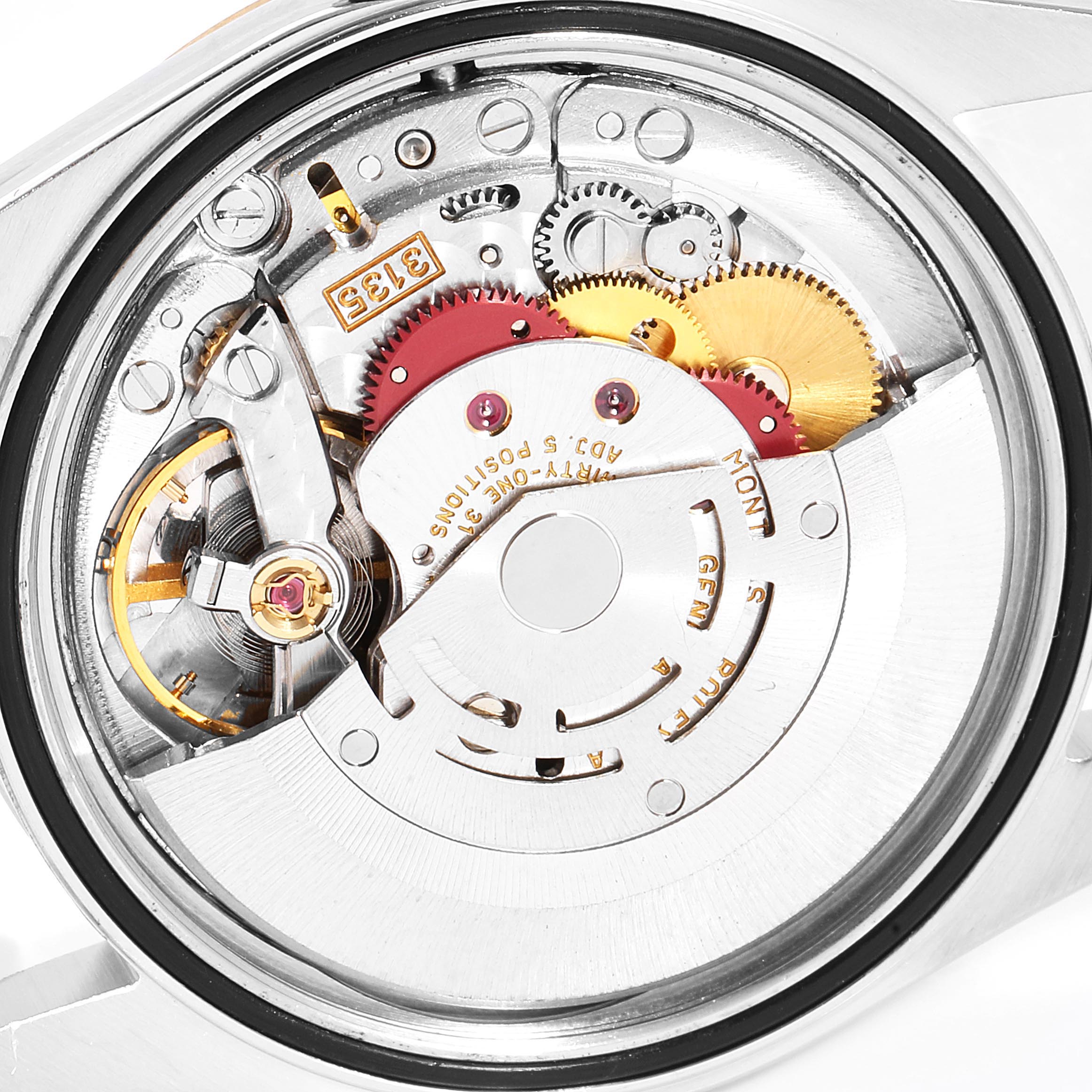 The image shows the back side of a Rolex Datejust 16233 Men's Steel and Gold (two tone) Champagne Dial 16233 Men's Steel and Gold (two tone) Champagne Dial watch, revealing its intricate internal movement and gears.