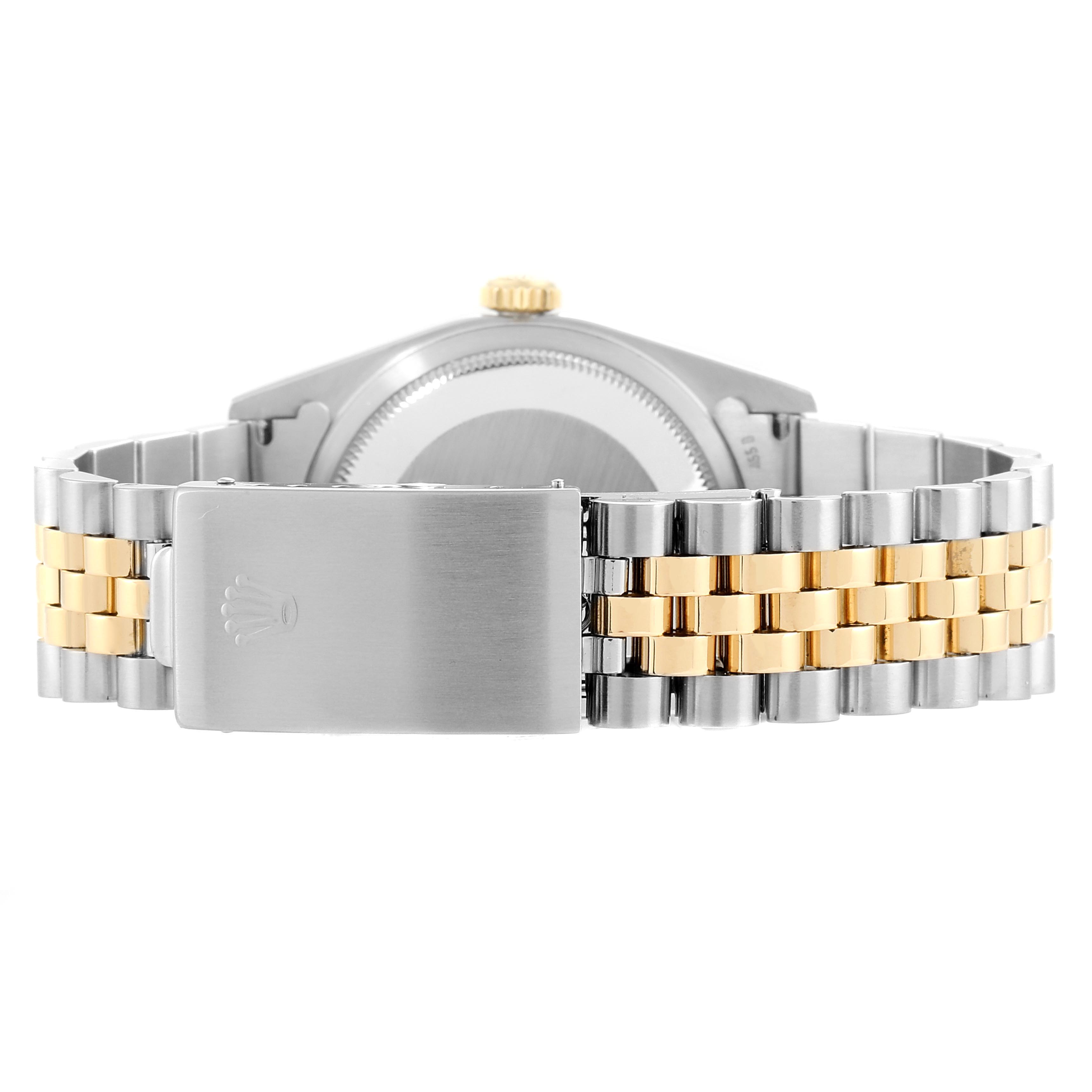 The image shows the back view of the Rolex Datejust 16233 Men's Steel and Gold (two tone) Champagne Dial 16233 Men's Steel and Gold (two tone) Champagne Dial watch, focusing on the two-tone bracelet and clasp.