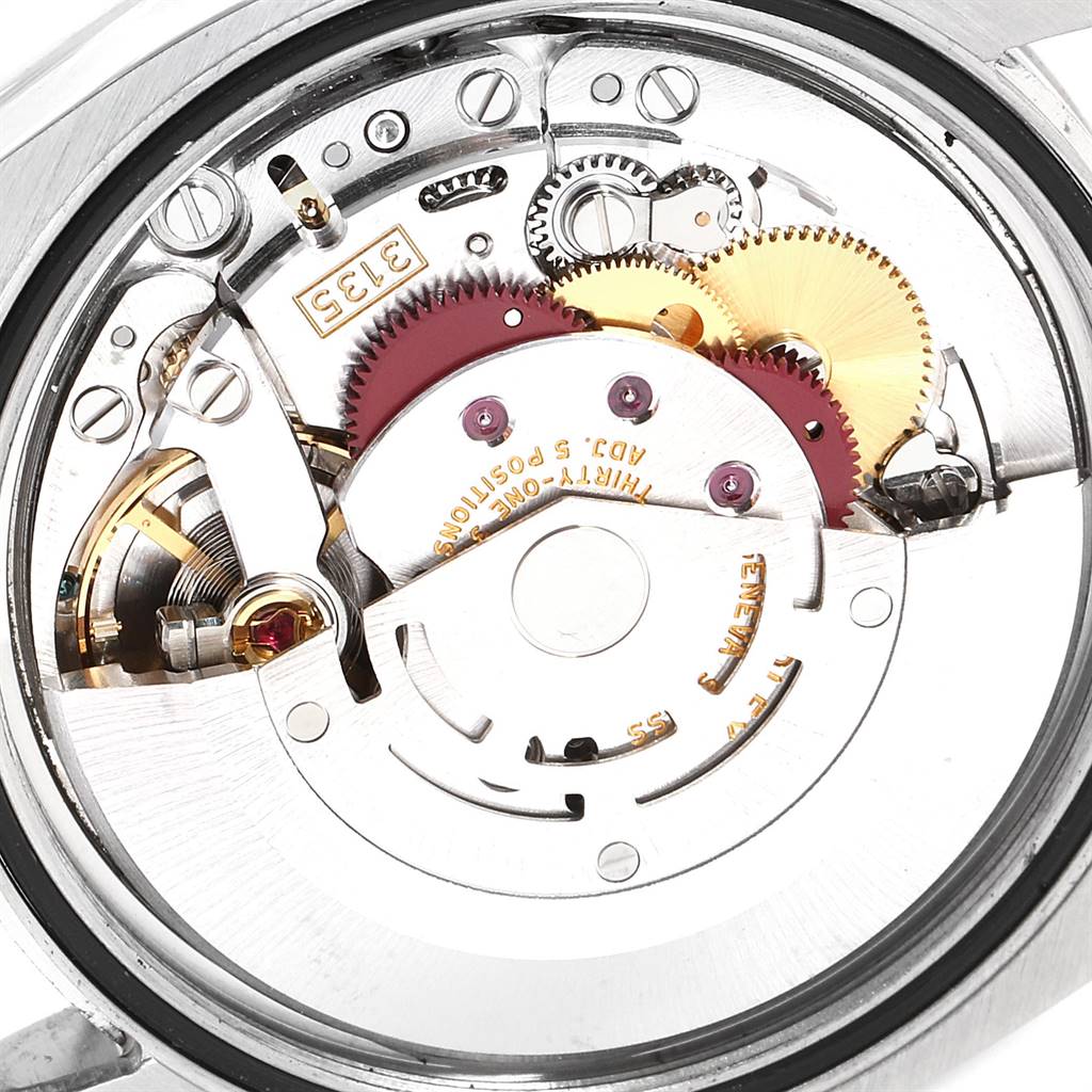 This image shows the inner mechanical movement of a Rolex Datejust 116234 Men's Stainless Steel Silver Dial 116234 Men's Stainless Steel Silver Dial watch, highlighting the gears and intricate components.