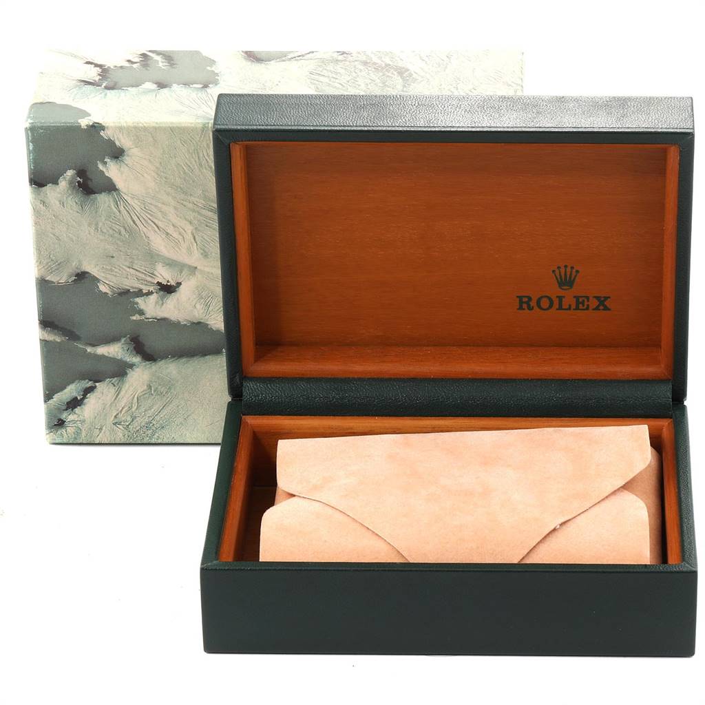 The image shows an open Rolex Datejust 16234 Men's Stainless Steel Silver Dial 16234 Men's Stainless Steel Silver Dial watch box with a suede pouch inside, alongside an outer decorative box.