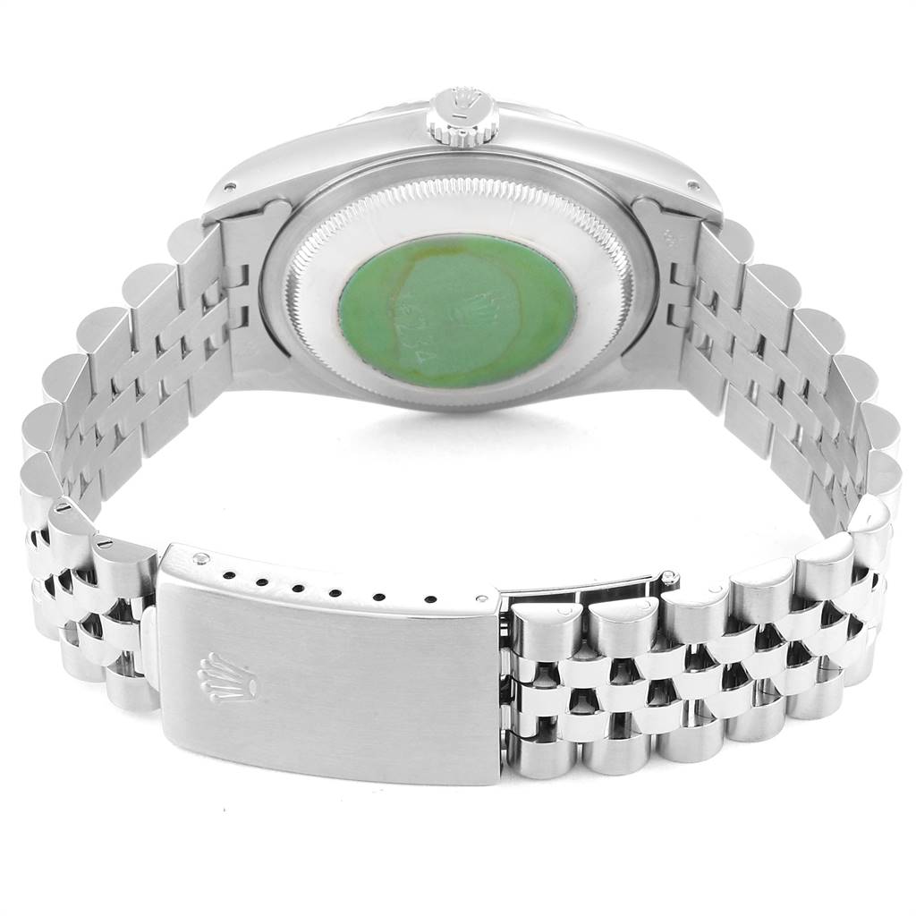 The image shows the back view of a Rolex Datejust 16234 Men's Stainless Steel Silver Dial 16234 Men's Stainless Steel Silver Dial watch, highlighting its case back and bracelet with a clasp.