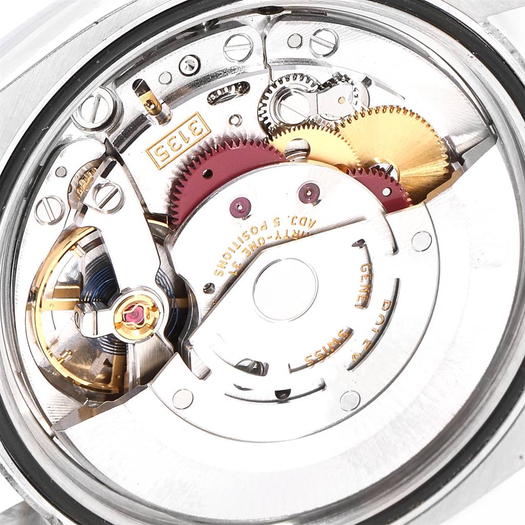 This image shows the internal mechanical movement and gears of a Rolex Datejust 116231 Men
s Steel and Gold (two tone) White Dial 116231 Men
s Steel and Gold (two tone) White Dial watch.