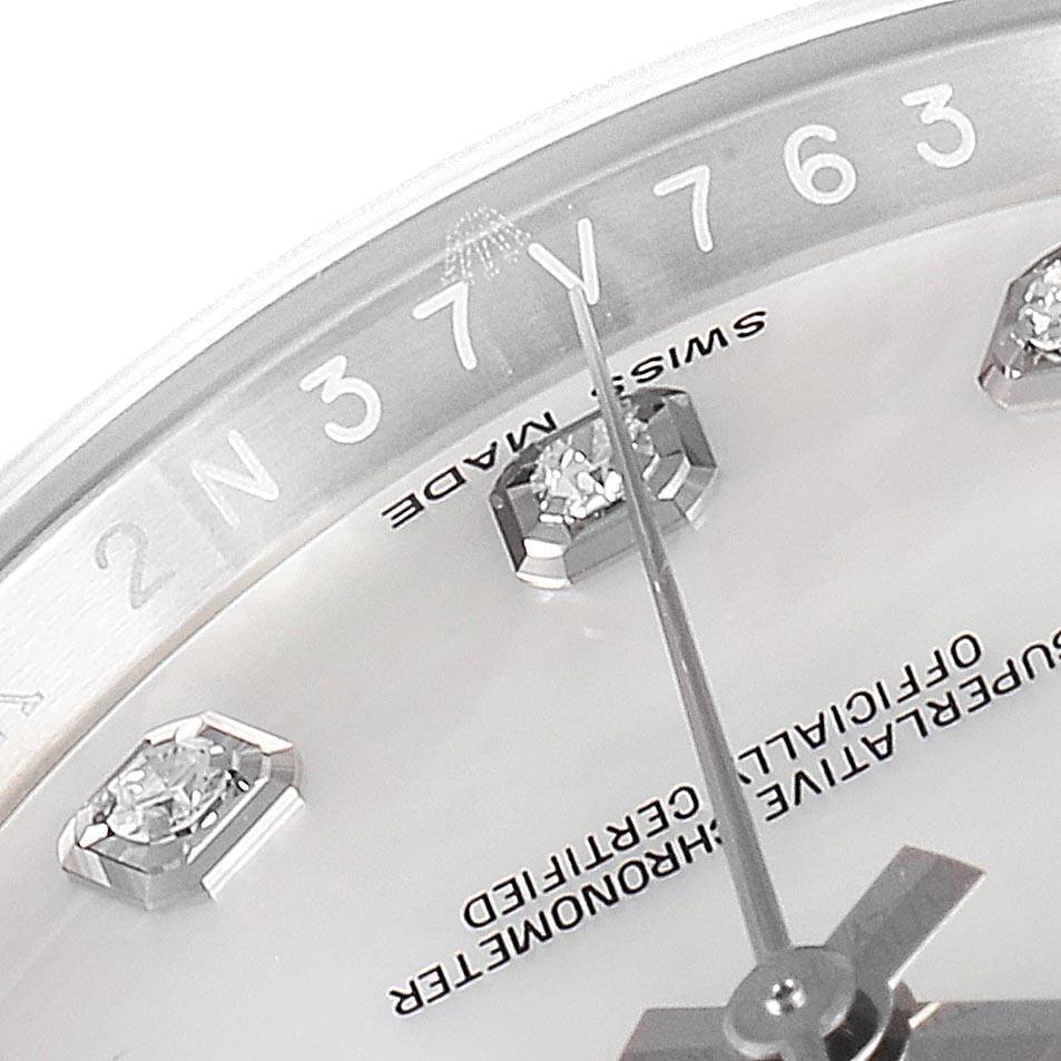 This image shows a close-up of the dial and part of the rehaut of a Rolex Datejust 116234 Men's Stainless Steel Mother of Pearl Dial 116234 Men's Stainless Steel Mother of Pearl Dial watch.