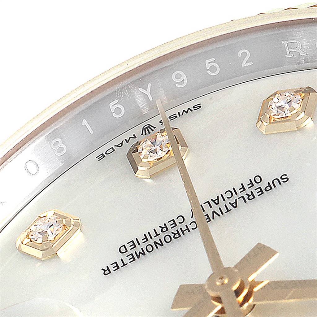 The close-up image shows the dial, diamonds, and hand of the Rolex Datejust 126233 Men's Steel and Gold (two tone) Mother of Pearl Dial 126233 Men's Steel and Gold (two tone) Mother of Pearl Dial watch.