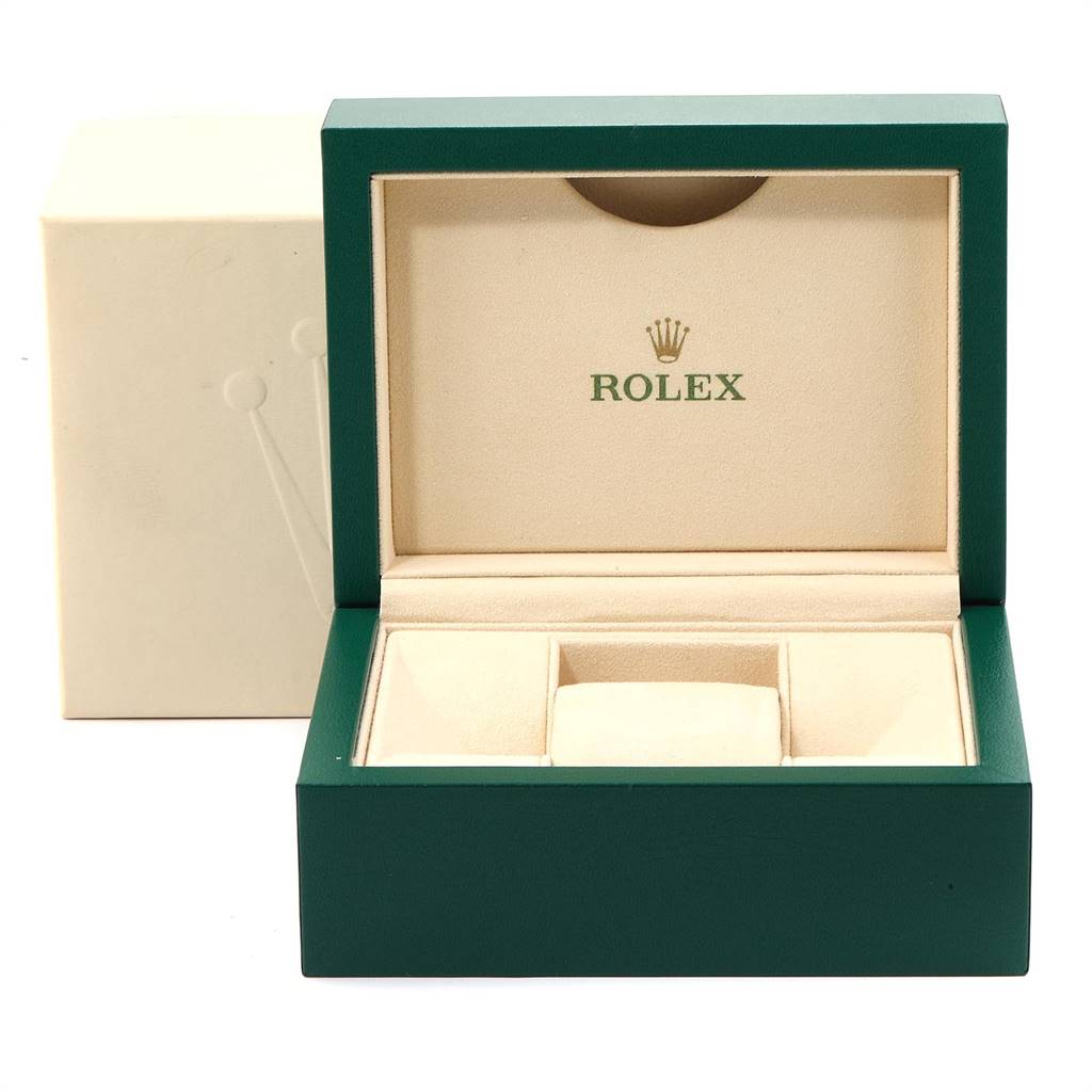 The image shows an open Rolex Datejust 126233 Men's Steel and Gold (two tone) Mother of Pearl Dial 126233 Men's Steel and Gold (two tone) Mother of Pearl Dial watch box with a cushioned insert, revealing the brand’s logo inside the lid.