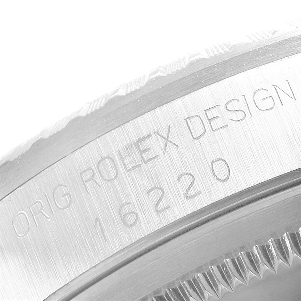 This image shows a close-up view of the case side of a Datejust model by Rolex, displaying the engraving "ORIG ROLEX DESIGN 16220."