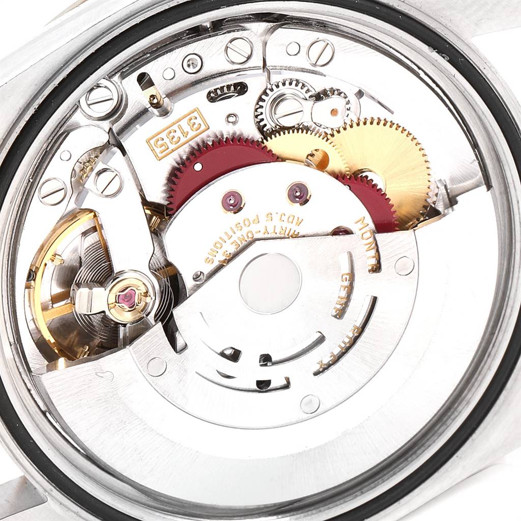 This image shows the internal movement mechanism of a Rolex Datejust 16233 Men's Steel and Gold (two tone) White Dial 16233 Men's Steel and Gold (two tone) White Dial watch from a top-down angle.