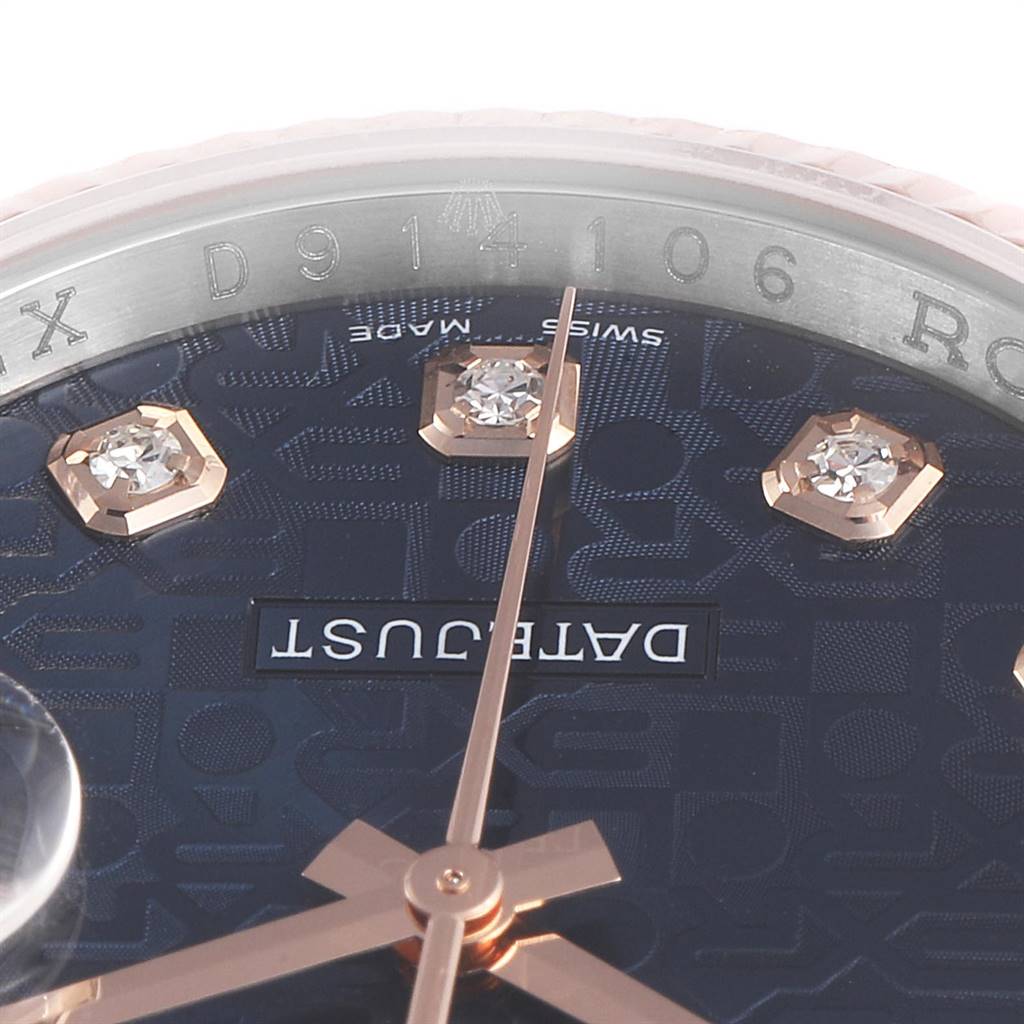 This image shows a close-up of the dial and markers of a Rolex Datejust 116231 Men's Steel and Gold (two tone) Blue Dial 116231 Men's Steel and Gold (two tone) Blue Dial watch, highlighting the brand name and diamond hour markers.