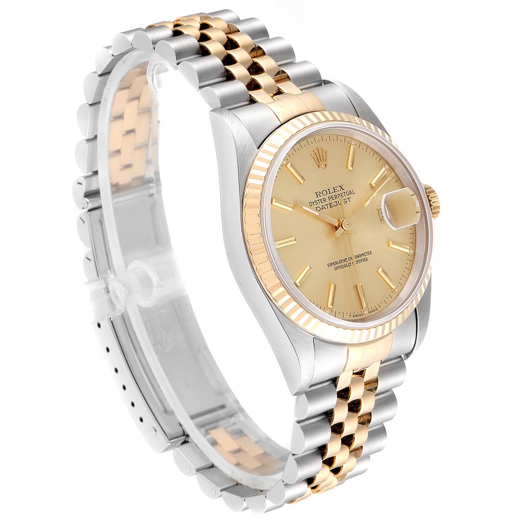 The Rolex Datejust 16233 Men's Steel and Gold (two tone) Champagne Dial 16233 Men's Steel and Gold (two tone) Champagne Dial watch is shown at a three-quarter angle, highlighting the face, bezel, and two-tone bracelet.
