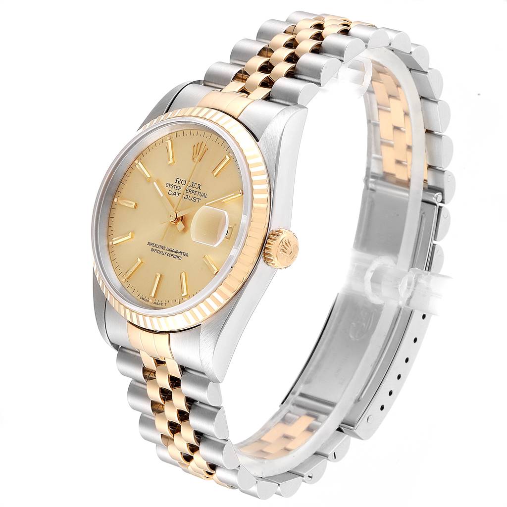 The Rolex Datejust 16233 Men's Steel and Gold (two tone) Champagne Dial 16233 Men's Steel and Gold (two tone) Champagne Dial watch is shown at a slight angle, highlighting the dial, crown, and bi-color bracelet.