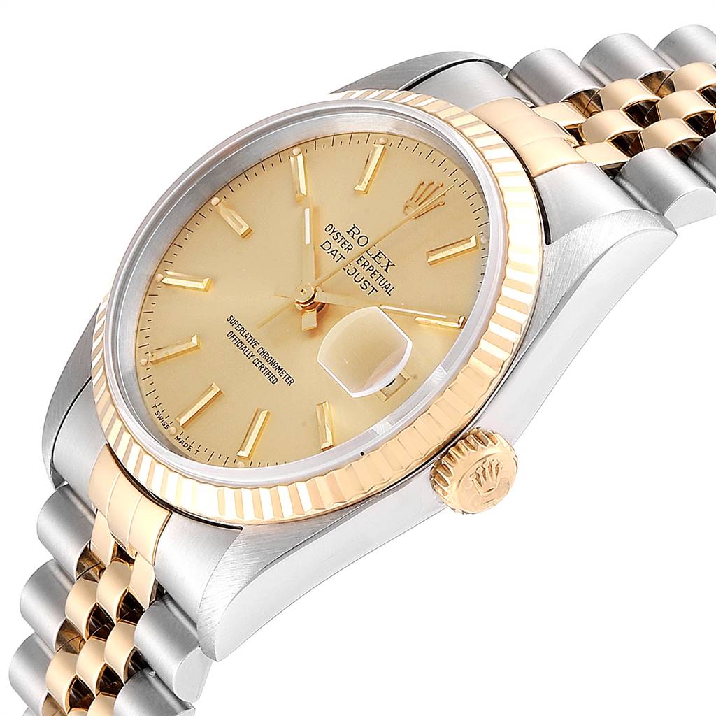This Rolex Datejust 16233 Men's Steel and Gold (two tone) Champagne Dial 16233 Men's Steel and Gold (two tone) Champagne Dial watch is shown from an angled side view, highlighting the bezel, dial, crown, and part of the bracelet.