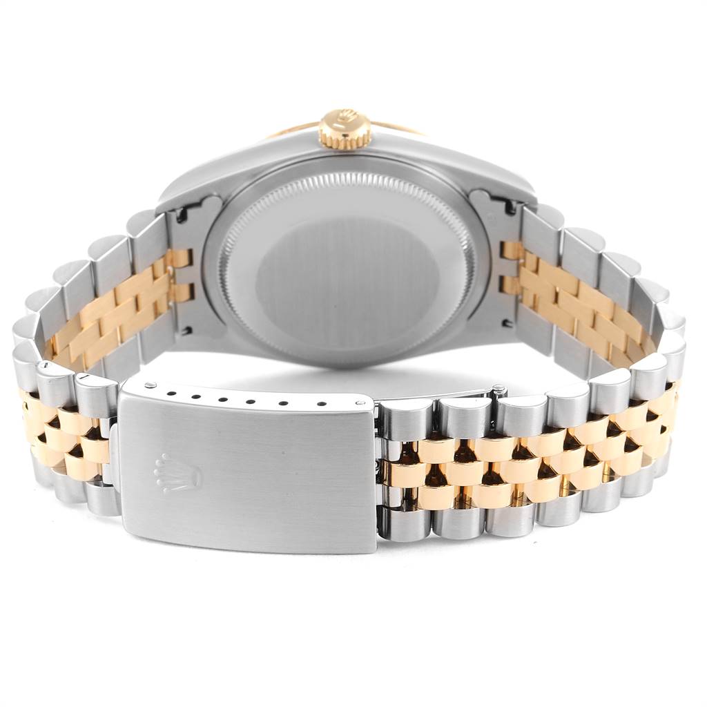 This image shows the back of a Rolex Datejust 16233 Men's Steel and Gold (two tone) Champagne Dial 16233 Men's Steel and Gold (two tone) Champagne Dial watch, highlighting the case back, crown, and jubilee bracelet with a clasp.