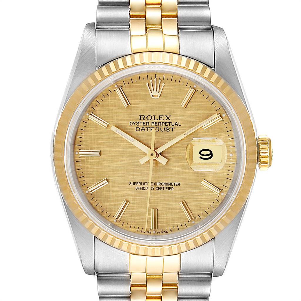 This is a front view of a Rolex Datejust 16233 Men's Steel and Gold (two tone) Champagne Dial 16233 Men's Steel and Gold (two tone) Champagne Dial watch showcasing the dial, hands, bezel, and part of the bracelet.