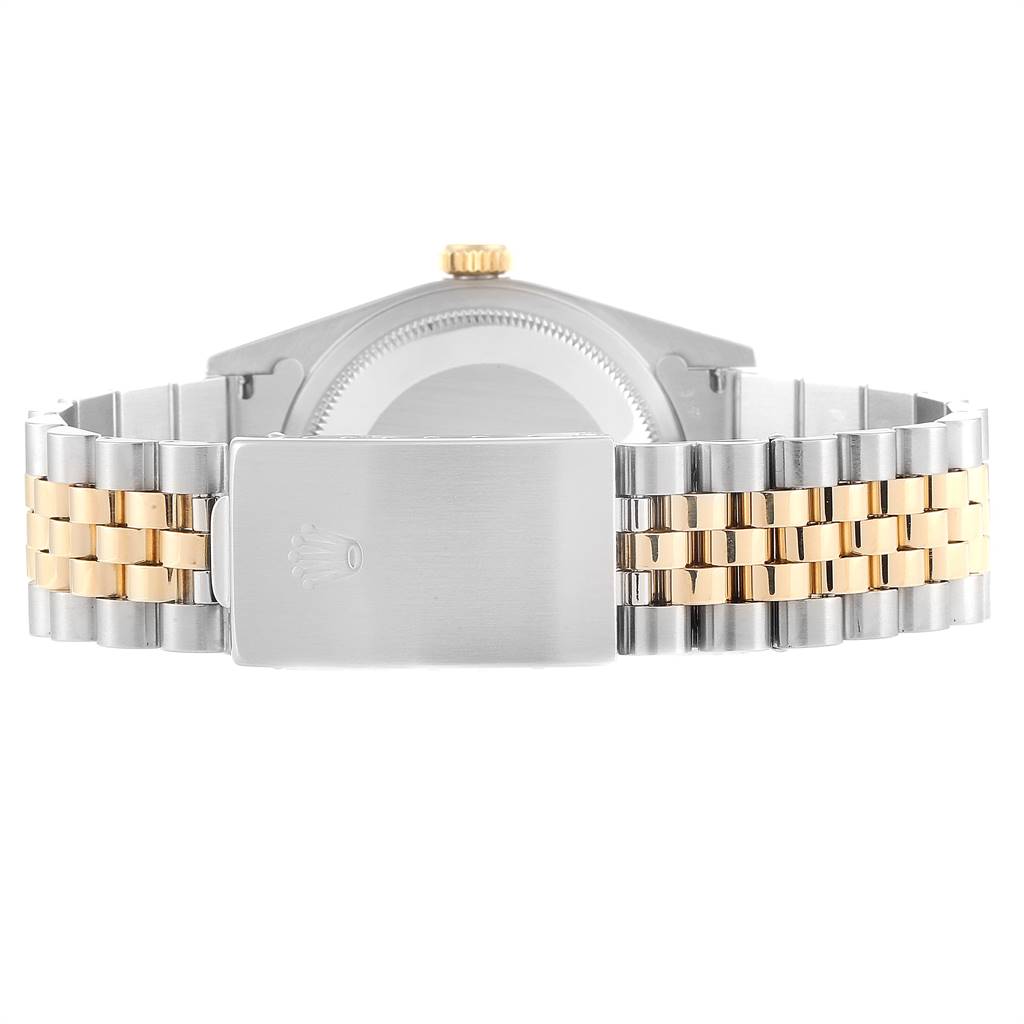 This image shows the back view of a Rolex Datejust 16233 Men
s Steel and Gold (two tone) Beige Dial 16233 Men
s Steel and Gold (two tone) Beige Dial watch, highlighting its Jubilee bracelet and clasp.