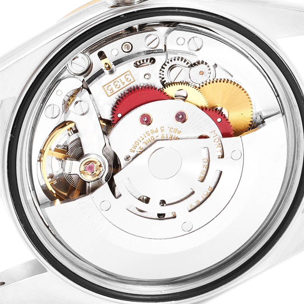 This image shows the internal mechanical movement of a Rolex Datejust 16233 Men
s Steel and Gold (two tone) Champagne Dial 16233 Men
s Steel and Gold (two tone) Champagne Dial watch from the back side.