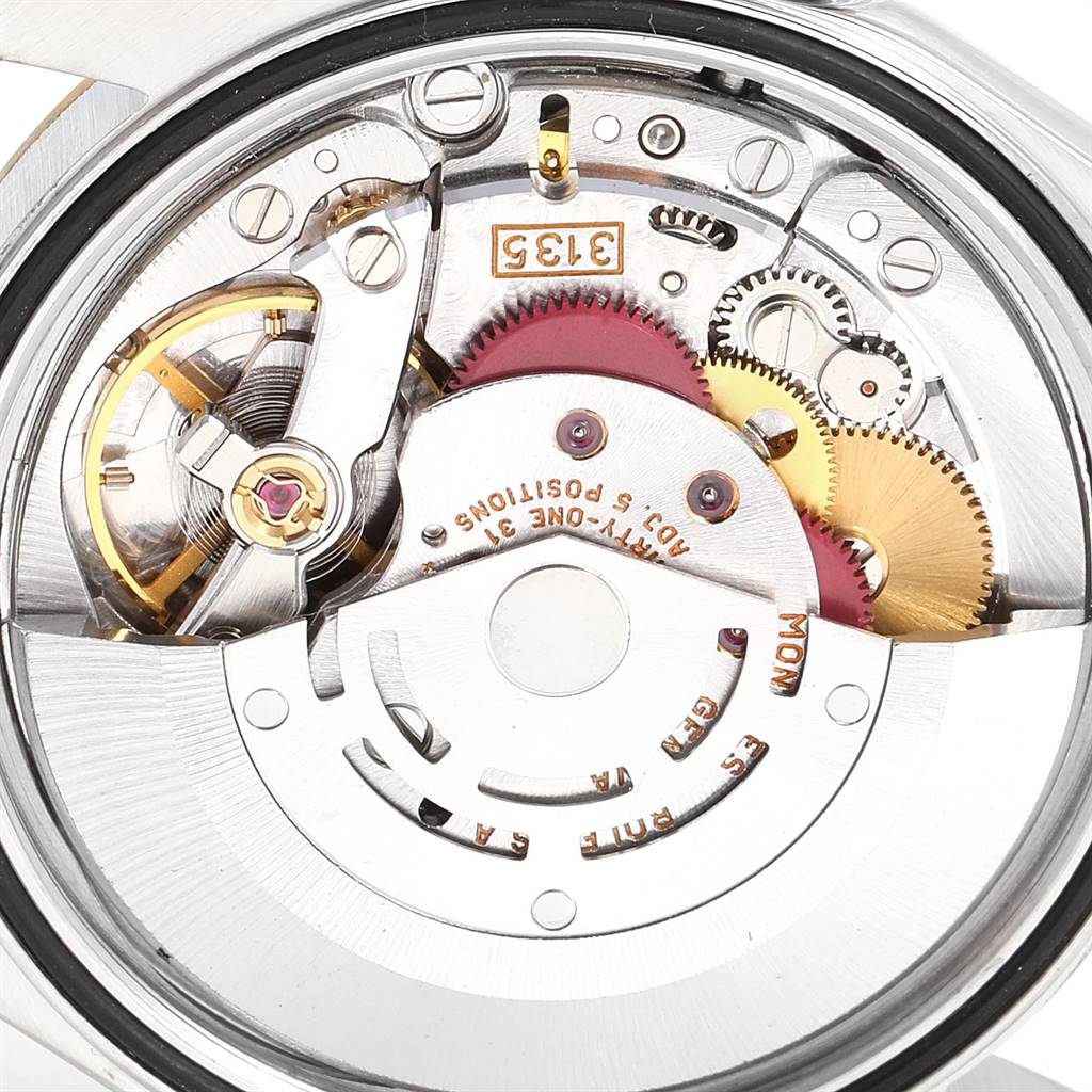 This is a close-up view of the movement mechanism inside a Rolex Datejust 16233 Men's Steel and Gold (two tone) Champagne Dial 16233 Men's Steel and Gold (two tone) Champagne Dial watch.
