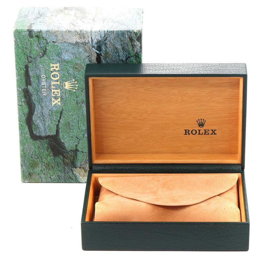 The image shows the box for a Rolex Datejust 16233 Men's Steel and Gold (two tone) Champagne Dial 16233 Men's Steel and Gold (two tone) Champagne Dial watch, including an outer green box and an inner wooden box with a leather pouch.
