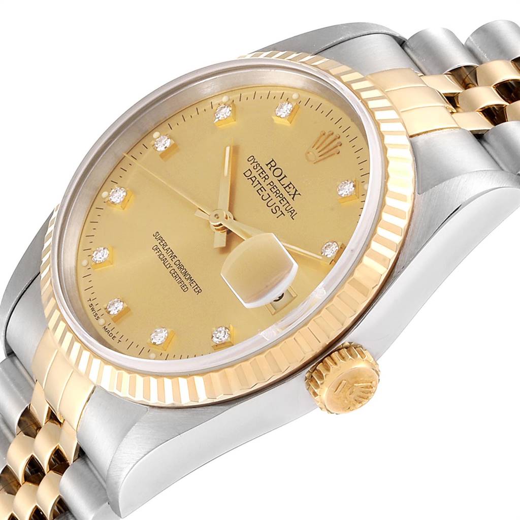 This image shows a close-up angled view of the Rolex Datejust 16233 Men's Steel and Gold (two tone) Champagne Dial 16233 Men's Steel and Gold (two tone) Champagne Dial watch, displaying the dial, bezel, crown, and part of the bracelet.