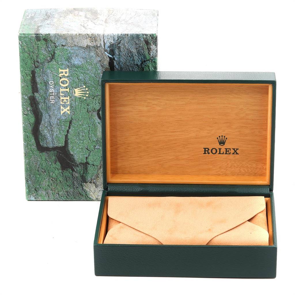 The image shows an open Rolex Datejust 16233 Men's Steel and Gold (two tone) Champagne Dial 16233 Men's Steel and Gold (two tone) Champagne Dial watch box with the lid up and its outer packaging.