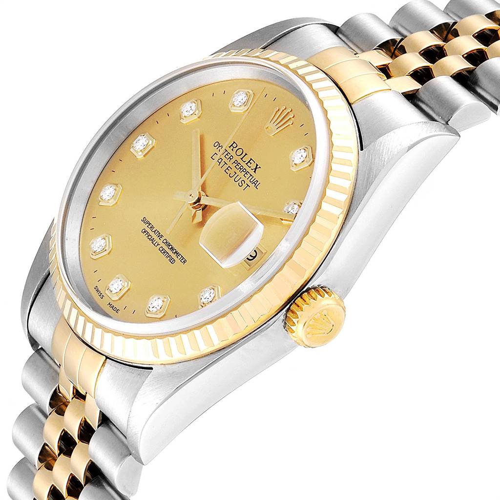 The image shows a close-up, angled view of the Rolex Datejust 16233 Men's Steel and Gold (two tone) Champagne Dial 16233 Men's Steel and Gold (two tone) Champagne Dial watch, displaying the dial, crown, and part of the bracelet.