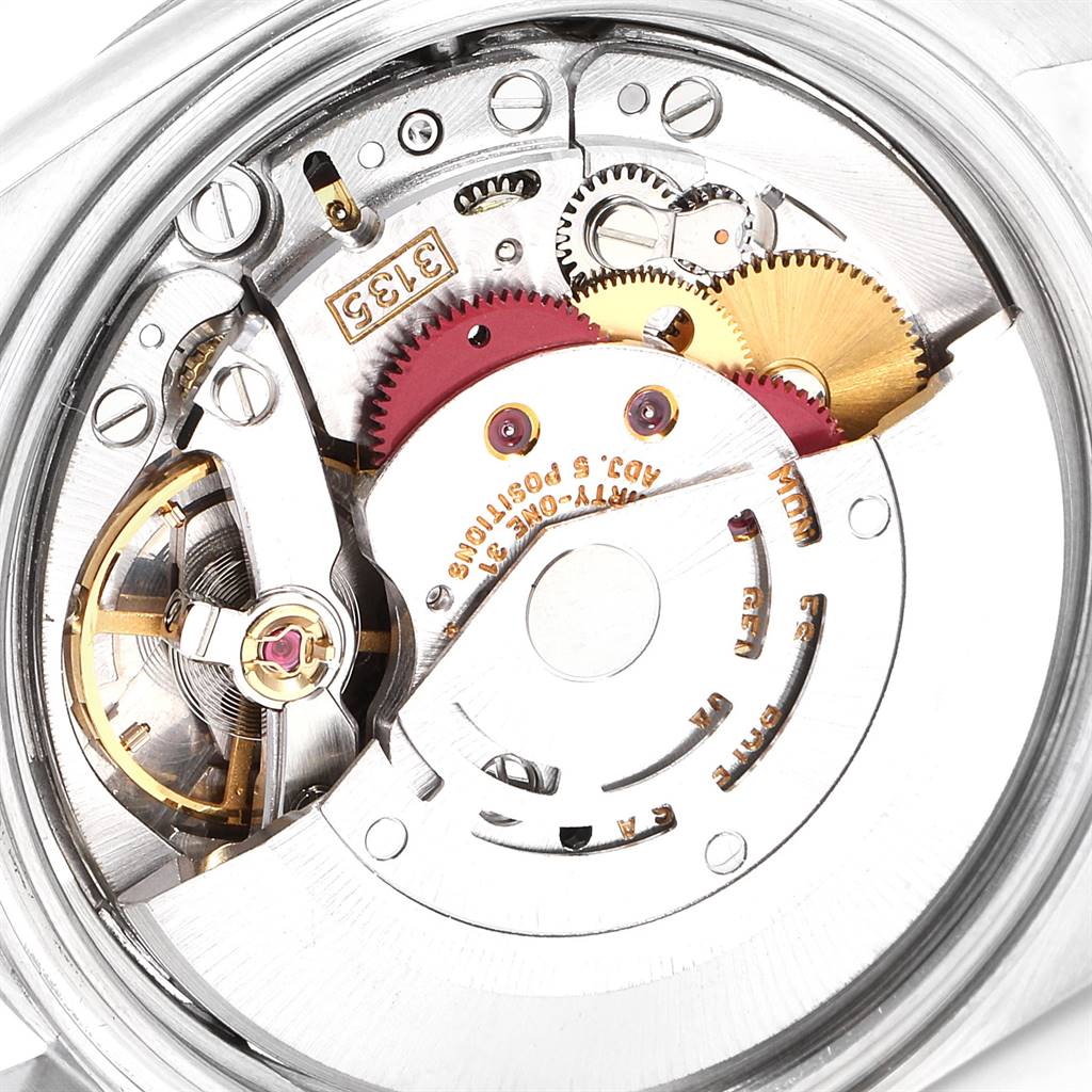 This close-up image shows the inner mechanical movement parts of a Rolex Datejust 16234 Men's Stainless Steel Silver Dial 16234 Men's Stainless Steel Silver Dial watch.