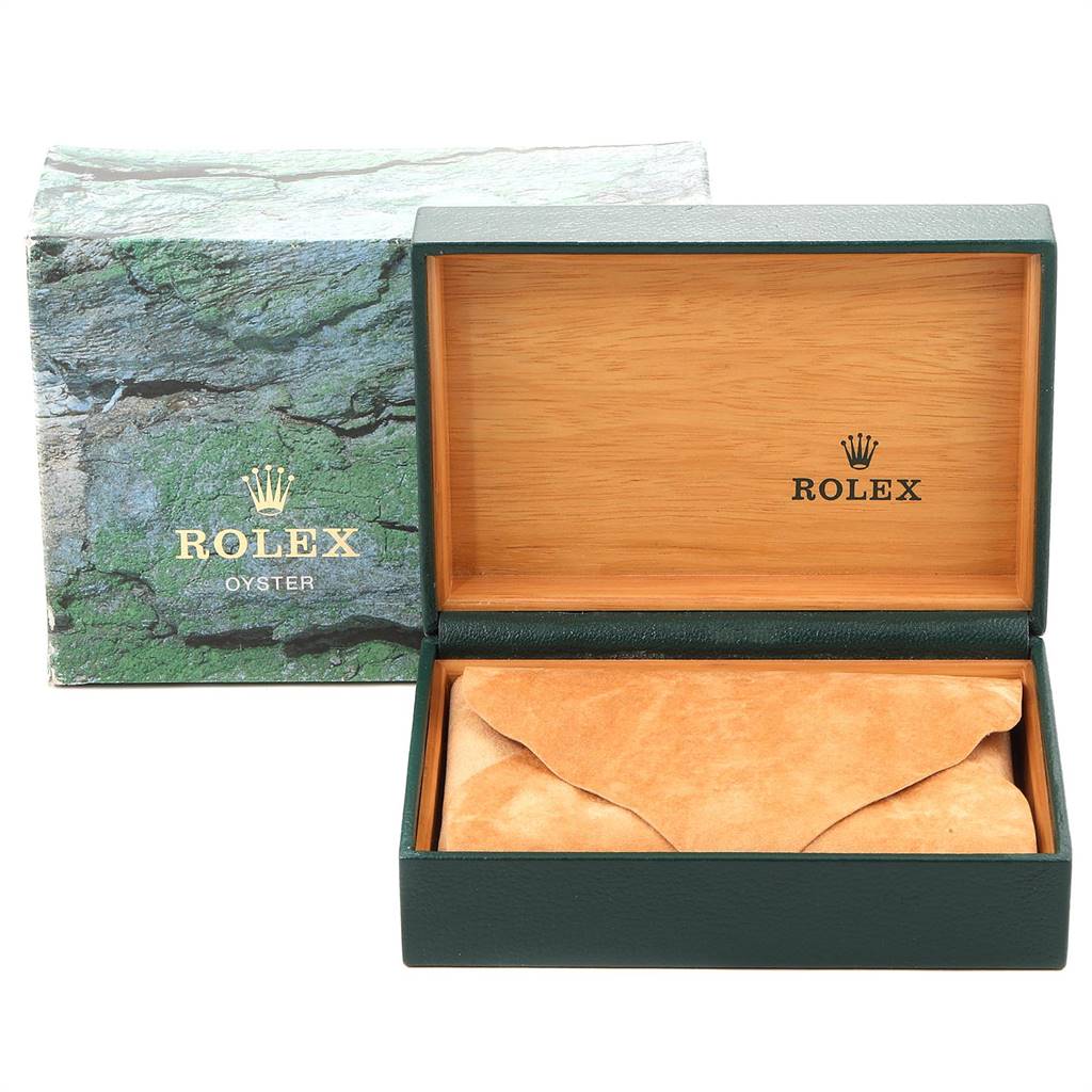 The image shows an open Rolex Datejust 16233 Men's Steel and Gold (two tone) Champagne Dial 16233 Men's Steel and Gold (two tone) Champagne Dial watch box with inner packaging, such as a suede pouch, visible from a front angle.