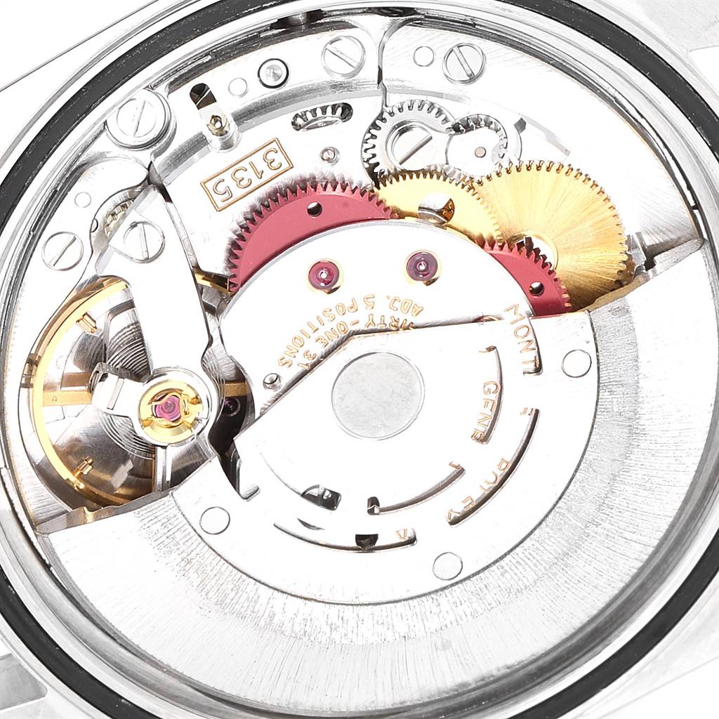 The image shows a close-up of the internal movement mechanisms of a Rolex Datejust 16233 Men's Steel and Gold (two tone) Champagne Dial 16233 Men's Steel and Gold (two tone) Champagne Dial watch.
