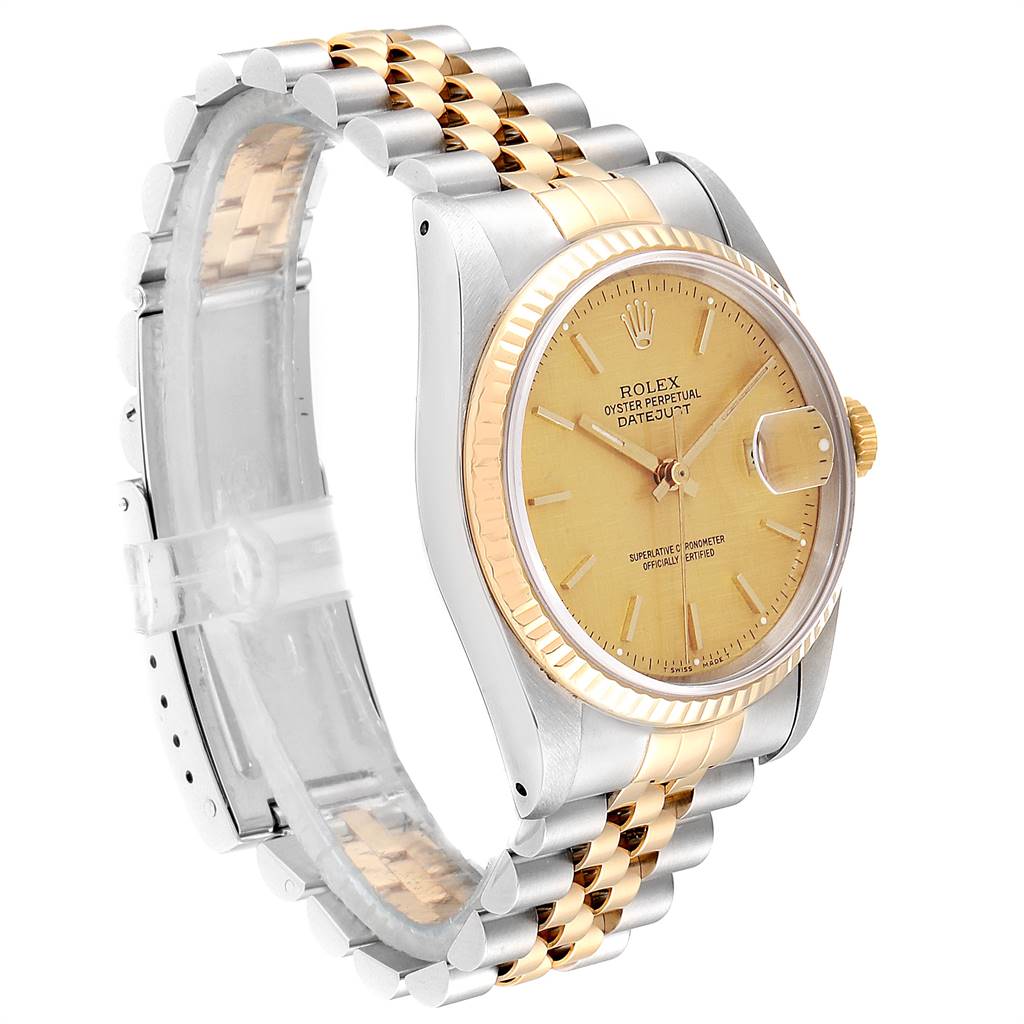 The image shows a Rolex Datejust 16233 Men's Steel and Gold (two tone) Champagne Dial 16233 Men's Steel and Gold (two tone) Champagne Dial watch at a slight angle, highlighting its gold dial, bezel, and two-tone bracelet.