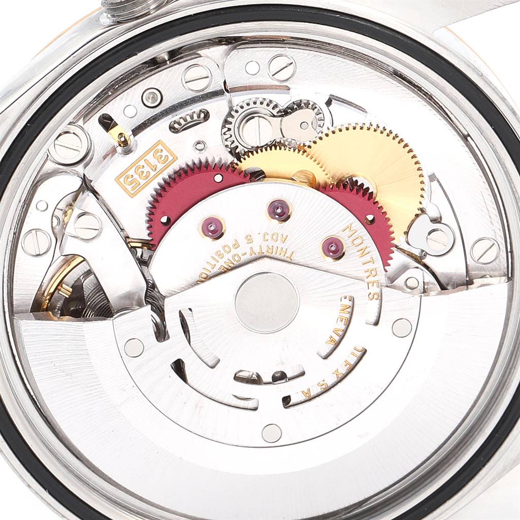 This image shows the movement mechanism of a Rolex Datejust 16233 Men's Steel and Gold (two tone) Mother of Pearl Dial 16233 Men's Steel and Gold (two tone) Mother of Pearl Dial watch from a top-down angle.