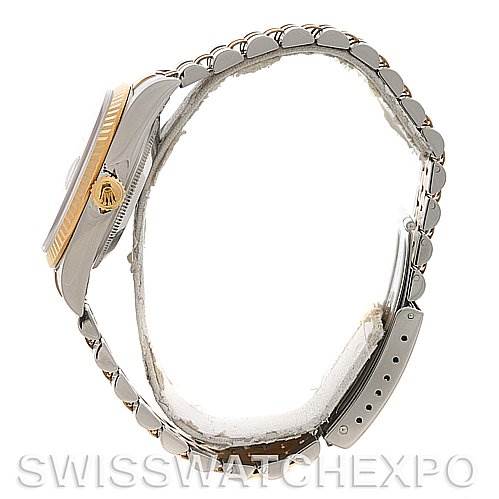 The image shows a side profile of a Rolex Datejust 16233 Men's Steel and Gold (two tone) White Dial 16233 Men's Steel and Gold (two tone) White Dial model, displaying its case, bezel, crown, and partial bracelet.