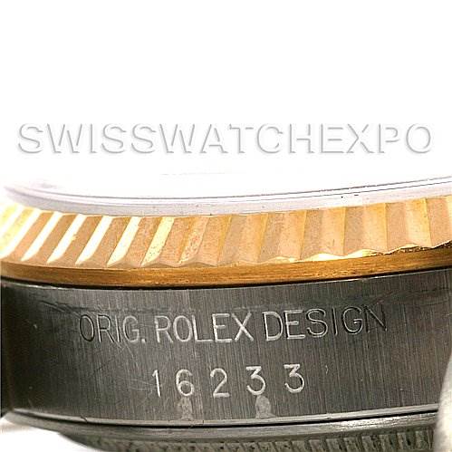 The image shows a close-up view of the side of a Rolex Datejust 16233 Men's Steel and Gold (two tone) White Dial 16233 Men's Steel and Gold (two tone) White Dial, highlighting its engraved model number (16233) and fluted bezel.