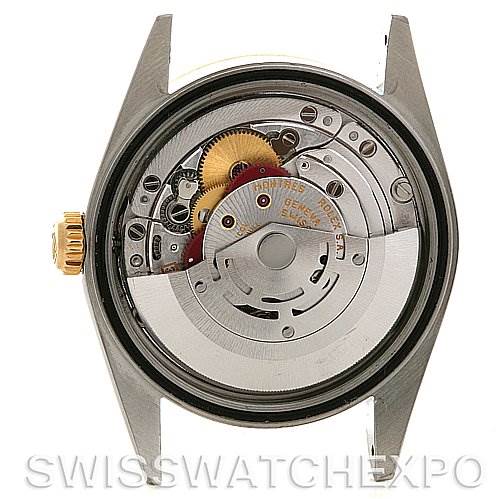 The image shows the back of a Rolex Datejust 16233 Men's Steel and Gold (two tone) White Dial 16233 Men's Steel and Gold (two tone) White Dial watch, focusing on its exposed mechanical movement.