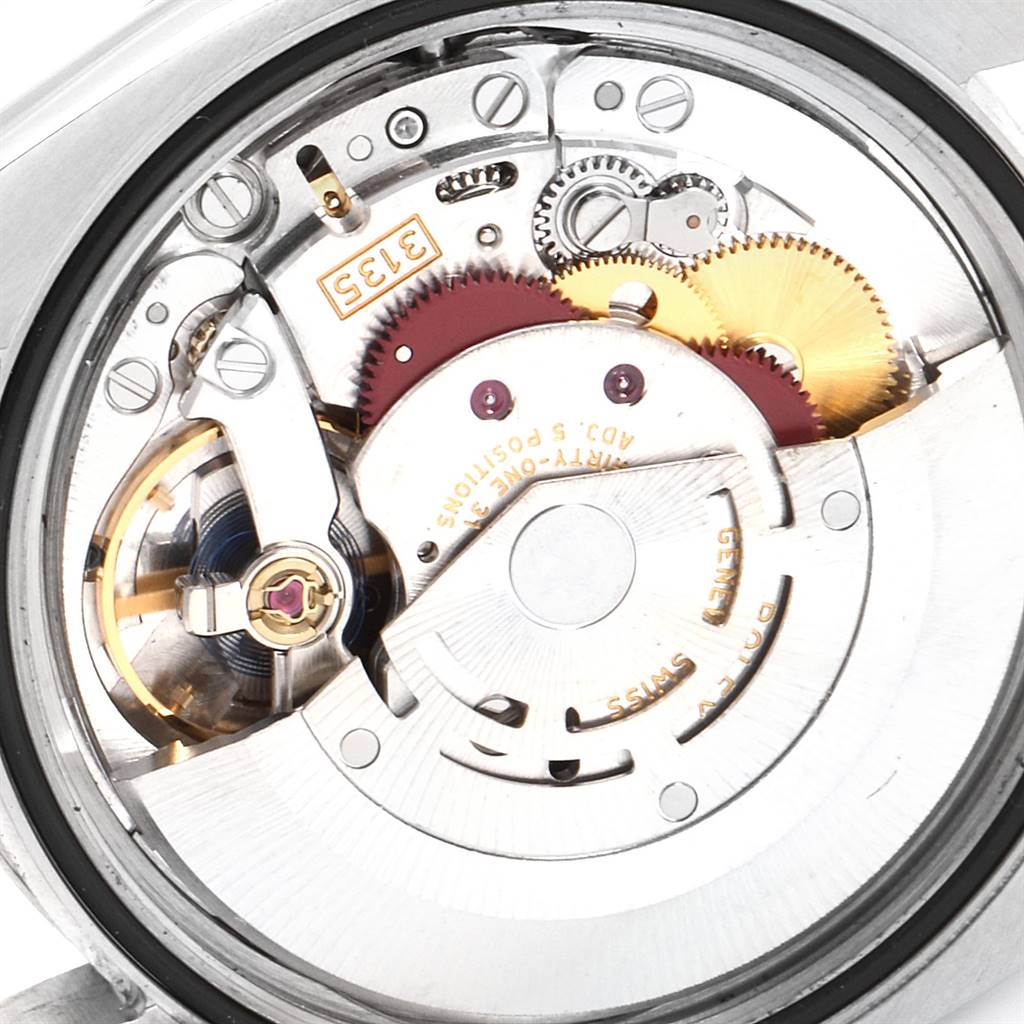 This image shows the internal mechanical components of a Rolex Datejust 116244 Men's Stainless Steel Silver Dial 116244 Men's Stainless Steel Silver Dial watch from a close-up angle.