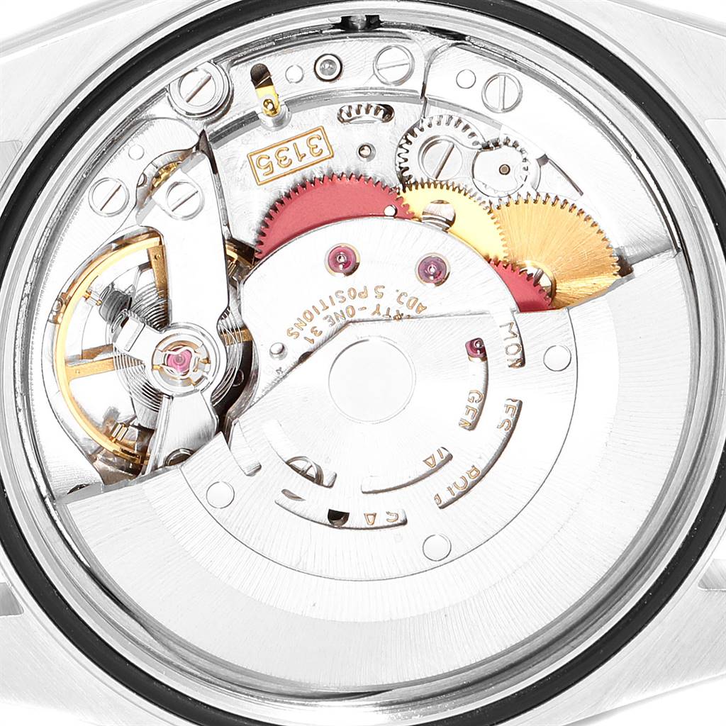 This image shows the internal mechanism and movement of a Rolex Datejust 16233 Men
s Steel and Gold (two tone) Black Dial 16233 Men
s Steel and Gold (two tone) Black Dial watch from the back.
